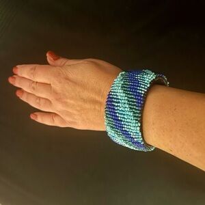 Beaded bangle bracelet in beautiful tones of blue.
